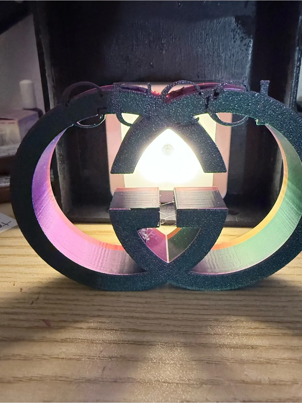 Gucci home accent iridescent color, changing purple, green gold